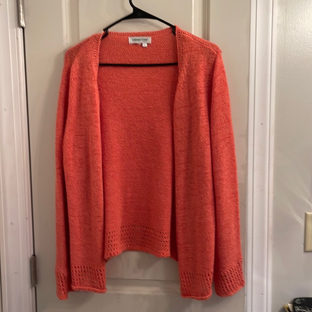 Beautiful peach colored sweater.